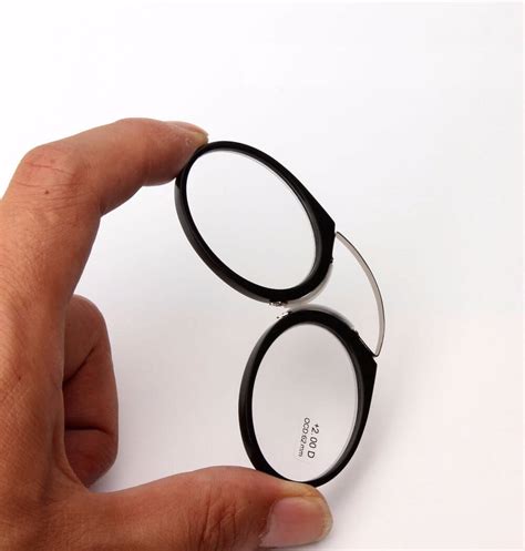 nose pincher reading glasses.